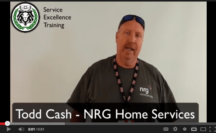 Todd Cash stands against a plain wall, wearing an NRG Home Services shirt and lanyard. As a dedicated plumber, he represents NRG Home Services. The Service Excellence Training logo appears at the top left, alongside text: "Todd Cash - NRG Home Services.