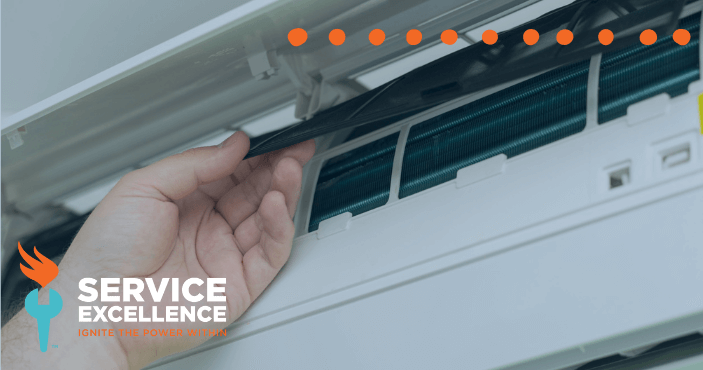 service technician checking a ductless ac