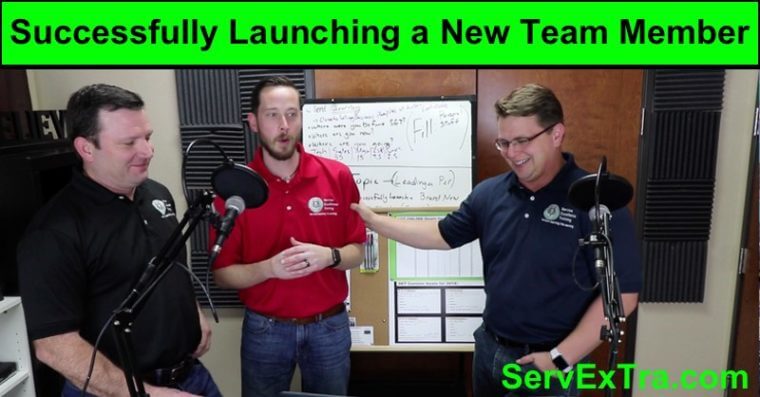Three men stand in front of a whiteboard with microphones beneath a banner that reads “Successfully Launching a New Team Member.” ServExtra.com, a leader in coaching for the home services industry, presents this service training session.