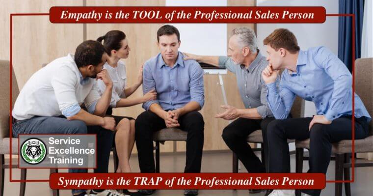 Five people sit in a circle, deeply engaged in conversation. Two gesture supportively toward a downcast man in the center. The text highlights the difference between empathy and sympathy for home service business owners working in professional sales.