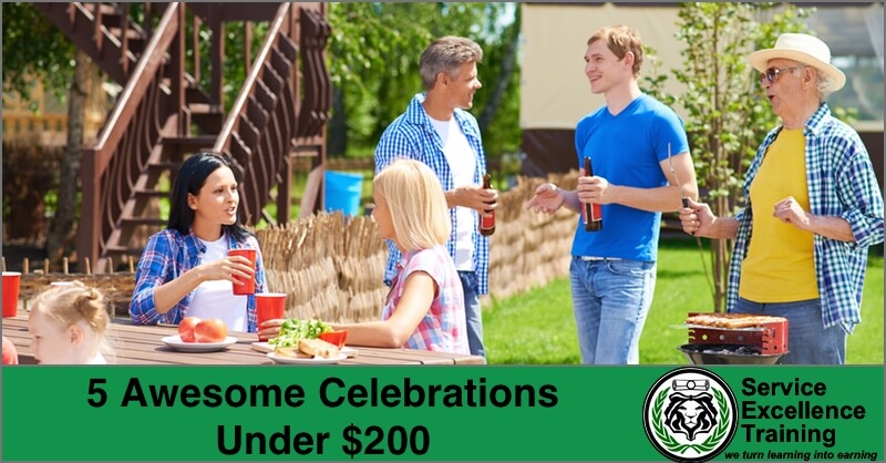 A group gathers outdoors around a picnic table filled with food and drinks. A banner displays "5 Awesome Celebrations Under $200" alongside the Service Excellence Training logo, promoting coaching tips for fun gatherings.
