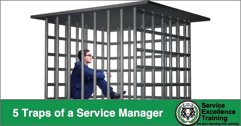A man in a suit sits in a metal cage, trapped. The text says, "5 Traps of Service Professionals" with the Service Excellence Training logo—ideal for electricians and HVAC technicians ready to break free.