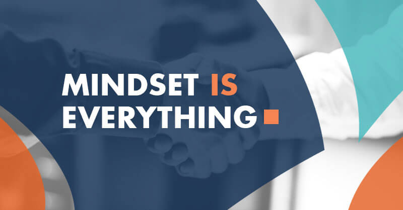 Two people shake hands in the background while bold white and orange text declares, "Mindset is Everything," inspiring home service business owners to embrace growth through coaching.