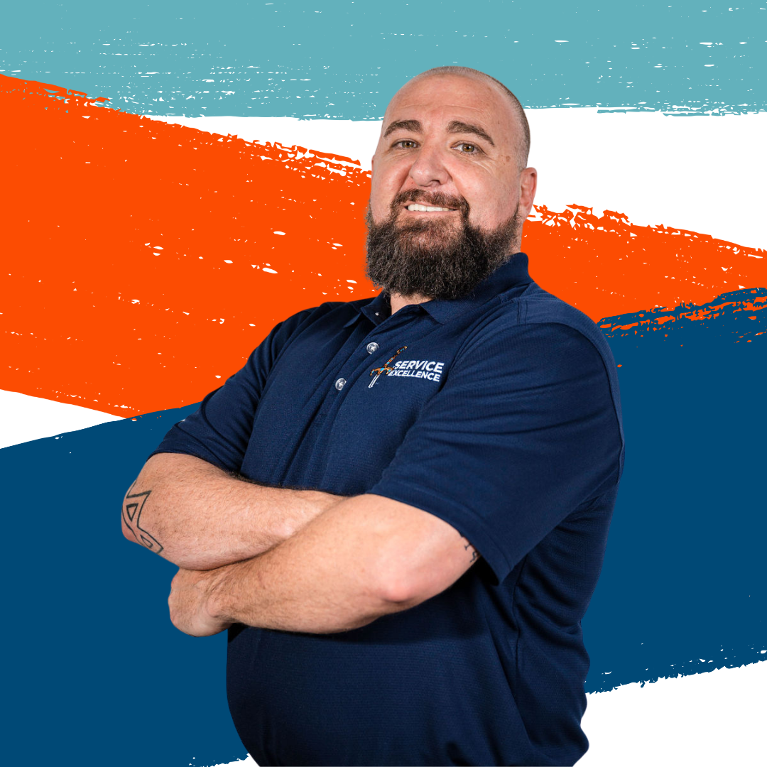 A bearded man with a tattoo on his forearm stands with arms crossed, wearing a navy blue polo. He perfectly embodies home service business owners. Teal, orange, and white brushstroke patterns fill the background.